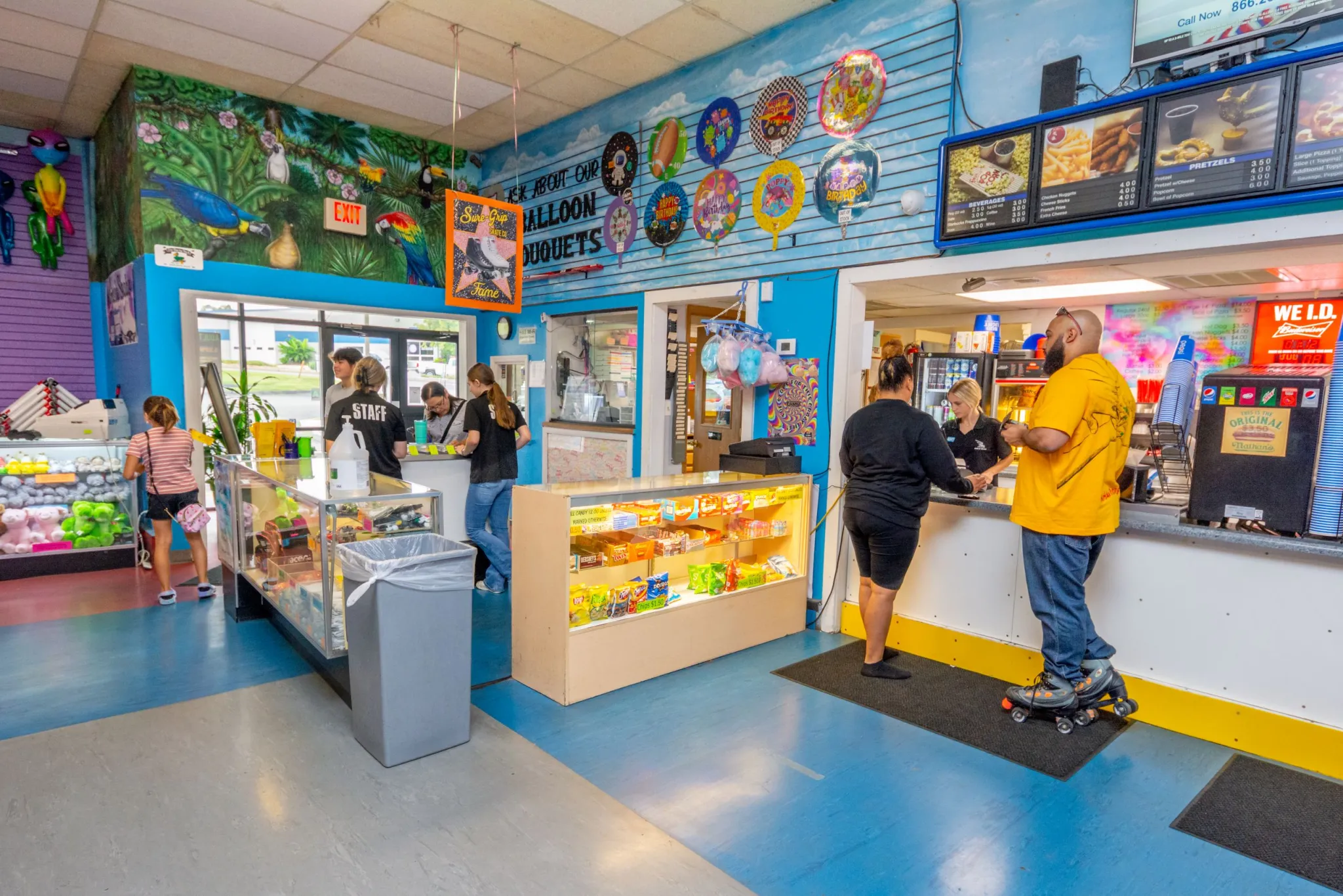Colorful ice cream shop interior with customers