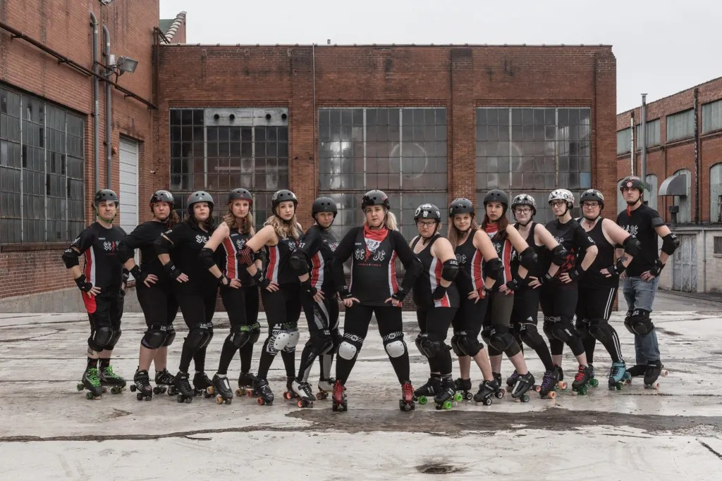 Women roller skaters in industrial setting